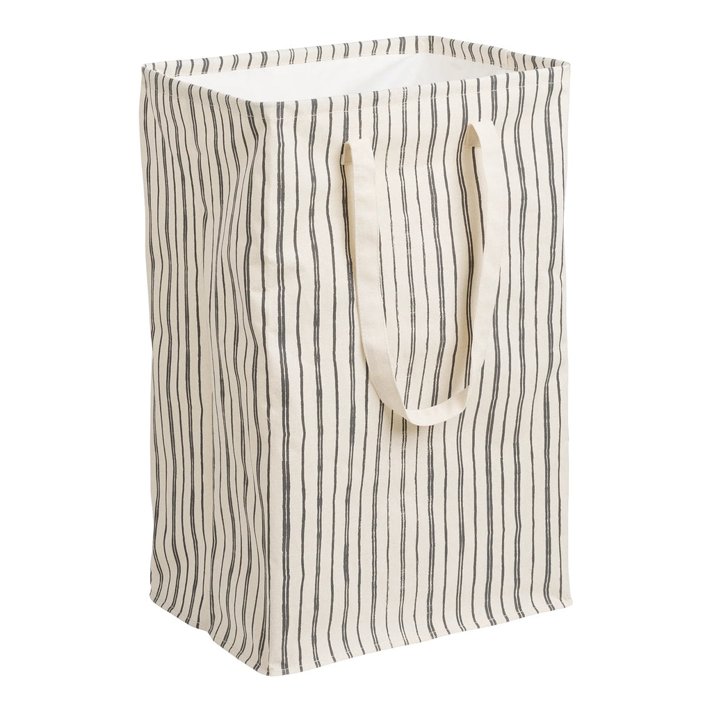 Cesto de ropa textil beige y negro