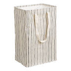 Cesto de ropa textil beige y negro