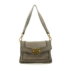 Bolso bandolera "AGNESE" de piel de vacuno teñida en prenda con costuras. Color: Cemento