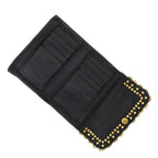 Cartera "MIRTA" con monedero de piel de vacuno teñida en prenda con tachuelas y medallas. Negro  Color: Negro