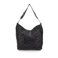 Bolso de hombro en piel de vacuno tejida y teñida en prenda, con asa de hombro con tachuelas