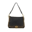 Bolso bandolera "Paola" de piel de vacuno teñida en prenda con tachuelas.