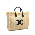 Bolso de mano y rafia