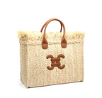 Bolso de mano y rafia