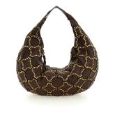 Bolso de hombro "MARISA" en piel de vacuno teñida en prenda con tachuelas. Marrón