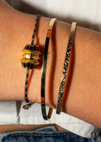 Pulsera Black Talisman de oro