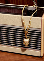 Collar Ivory Big Talisman de oro
